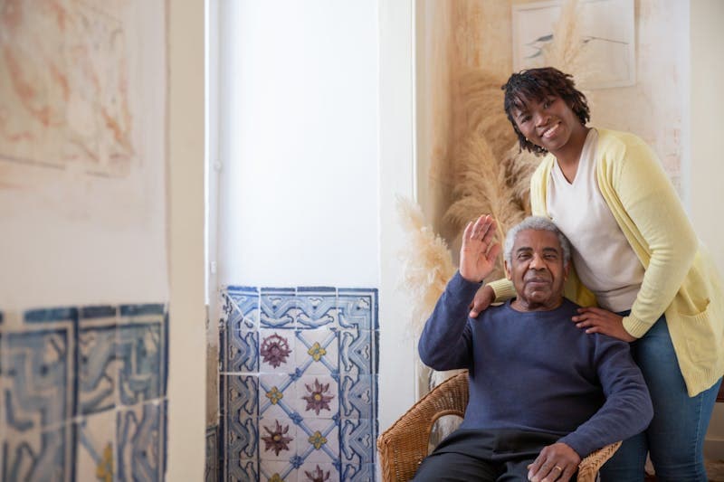Happy seniors enjoying a bright, modern assisted living community